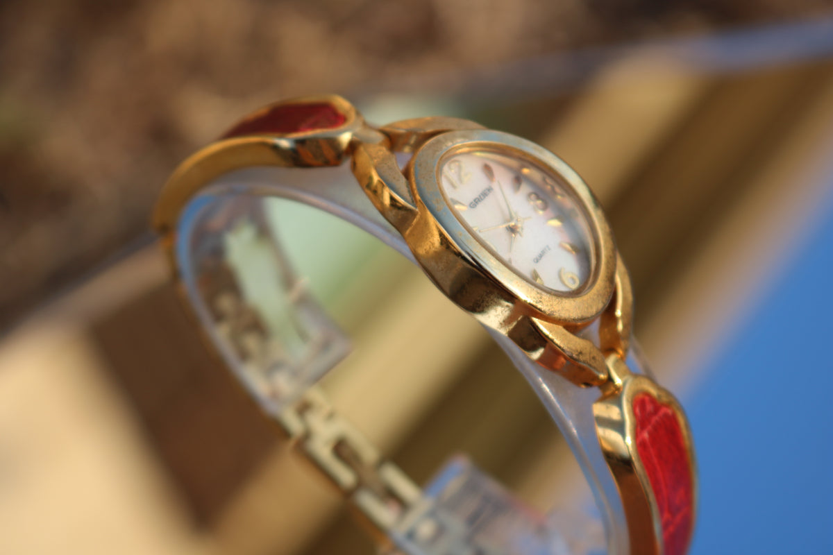 Vintage Gruen Gold-Tone Red Accent Bangle Watch