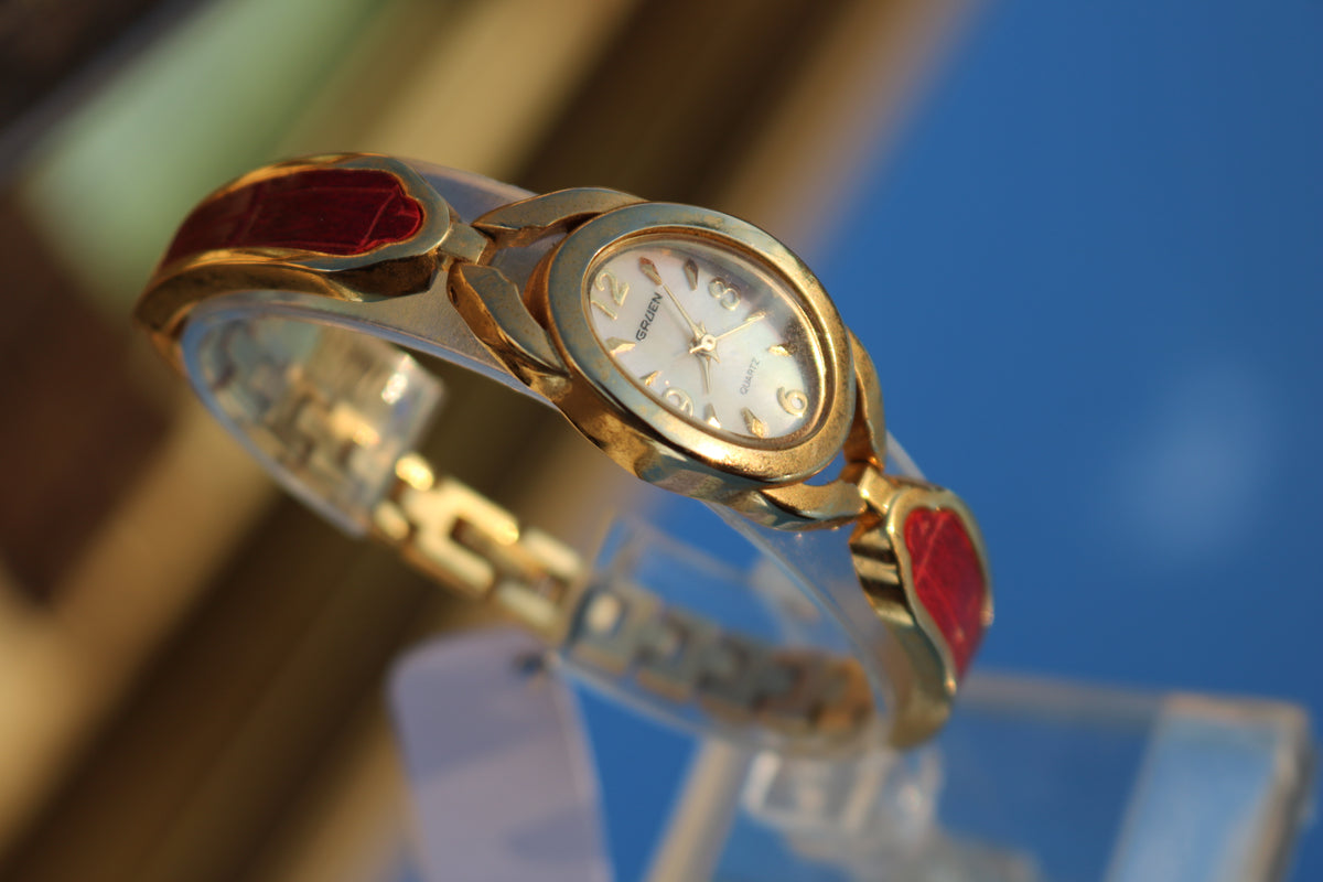 Vintage Gruen Gold-Tone Red Accent Bangle Watch
